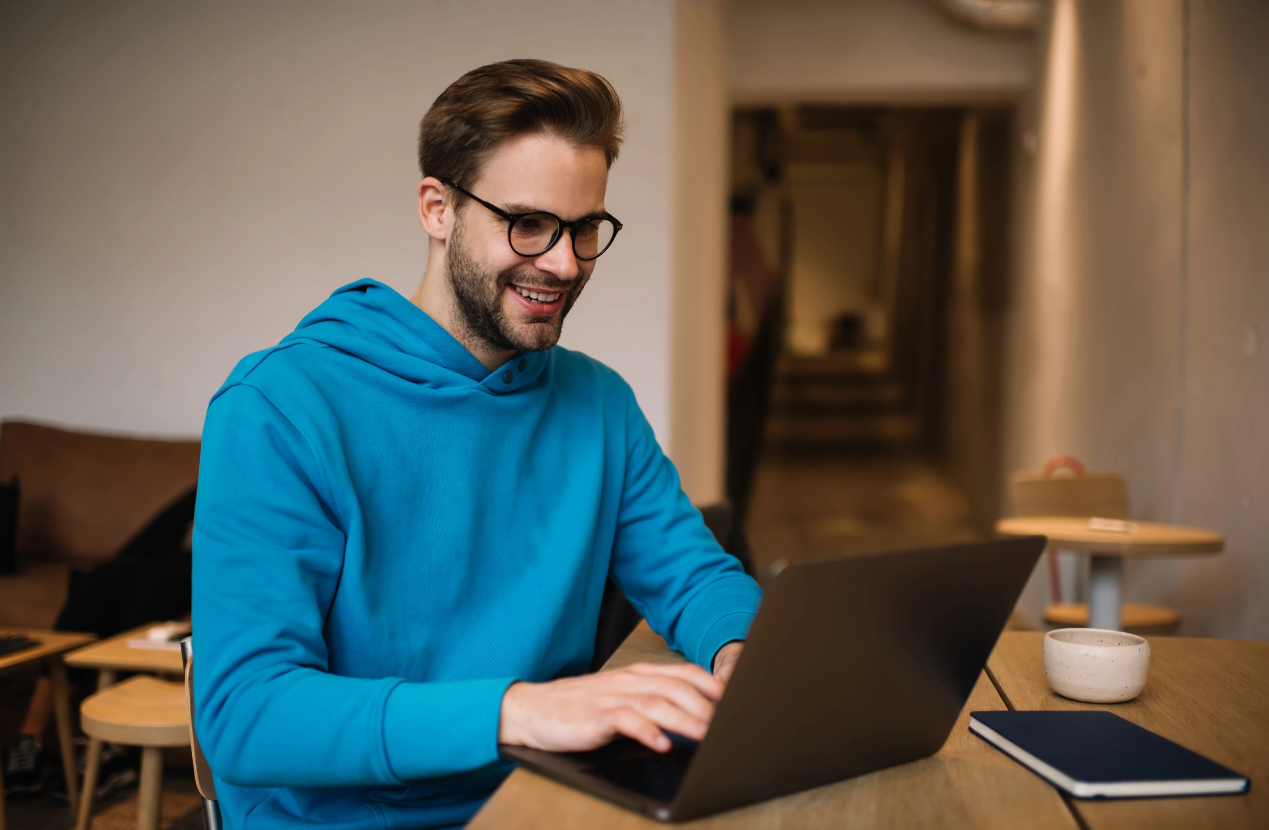 A man using online banking on his laptop.
